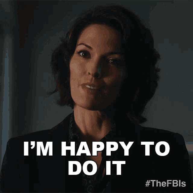a woman says " i 'm happy to do it " in front of a dark background