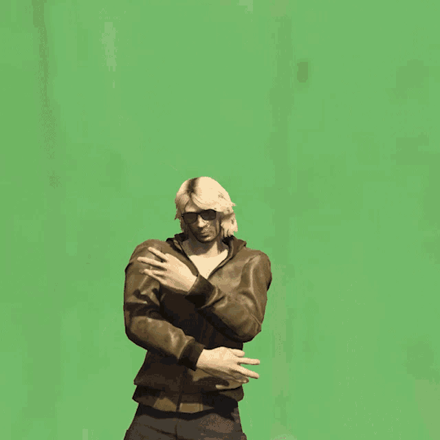 a man in a brown jacket and sunglasses is standing in front of a green screen