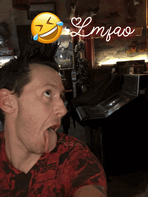 a man making a funny face with the word lmfao written above him