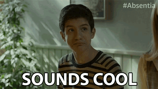 a young boy says " sounds cool " in a striped shirt
