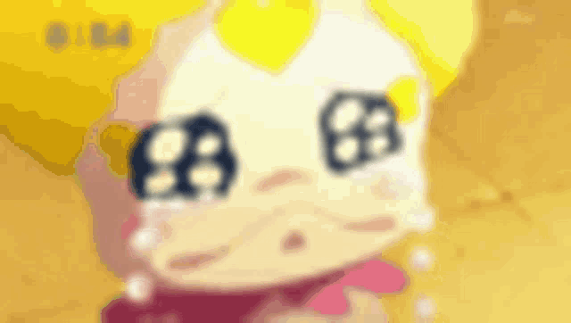 a close up of a cartoon character with tears running down her face .