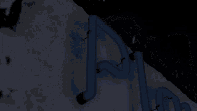 the word under is written in black and white on a blue background