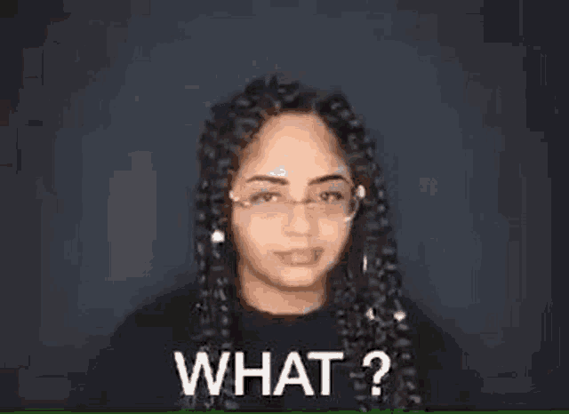 a young woman with braids and glasses is asking what .