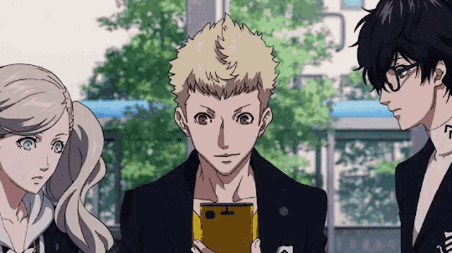 a group of anime characters are standing next to each other and one of them is holding a cell phone .