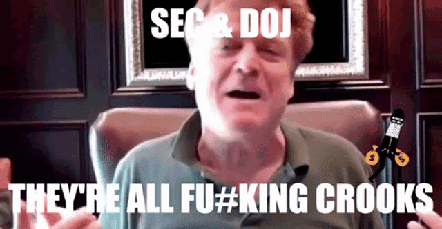 a man sitting in a chair with the words sec & doj they 're all fu #king crooks