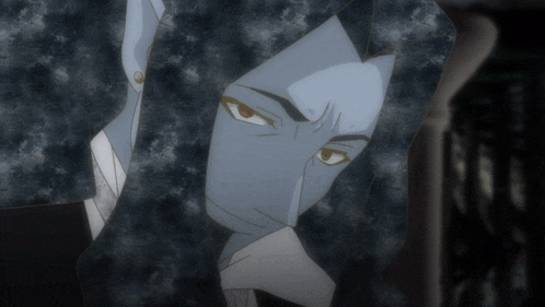 a close up of a man 's face with a blue mask