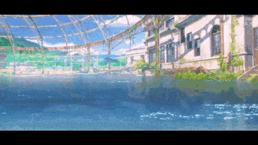 a building that is surrounded by water with a dolphin in the water