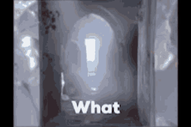 a doorway with a light coming through it and the words `` what '' written on the bottom .