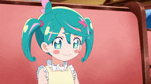 a little girl with blue hair and a bow in her hair