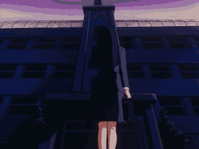 a girl stands in front of a building with a clock tower that says ' x ' on it