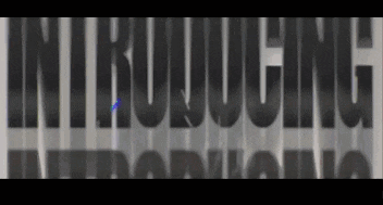 a close up of the word introducing on a wall