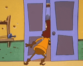 a cartoon character is standing in a doorway .