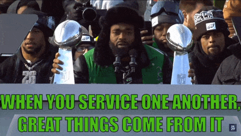 a man holding a trophy with the words " when you service one another great things come from it " on the bottom