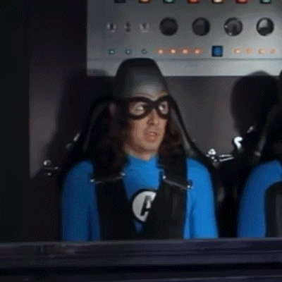 a man wearing a helmet and goggles with the letter a on his shirt