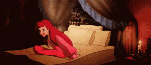 ariel from the little mermaid is laying on a bed with a candle in the background .