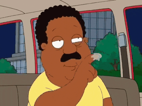 a cartoon character with a mustache is sitting in a car with his hand on his mouth
