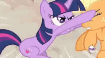 twilight sparkle from my little pony is sitting on a table with a pony .