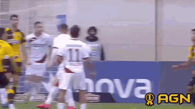 a soccer player with the number 11 on his shirt