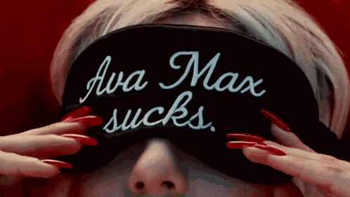 a woman with long red nails is wearing a black eye mask that says ava max sucks