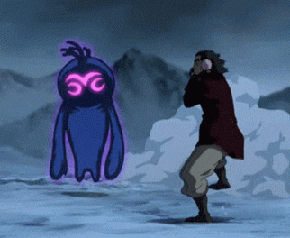 a person standing in front of a purple monster with the letters yc on it