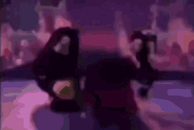 a purple and pink background with a blurred image