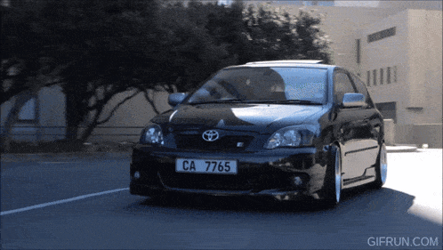 a black toyota with the license plate ca 7765