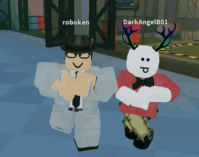 two roblox characters standing next to each other with roboken and darkangelb01 written on their faces