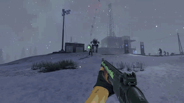 a person holding a gun with a green light coming out of the barrel