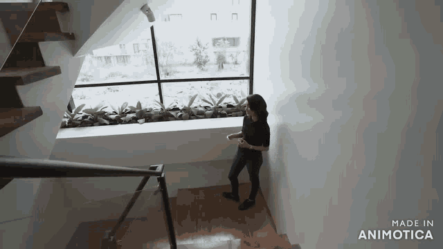 a woman standing on a set of wooden stairs made in animatica