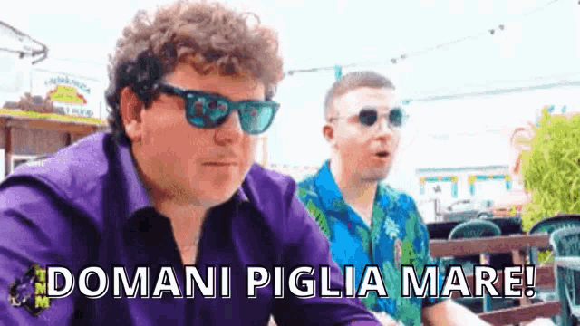 a man wearing sunglasses and a purple shirt says " domani figlia mare "
