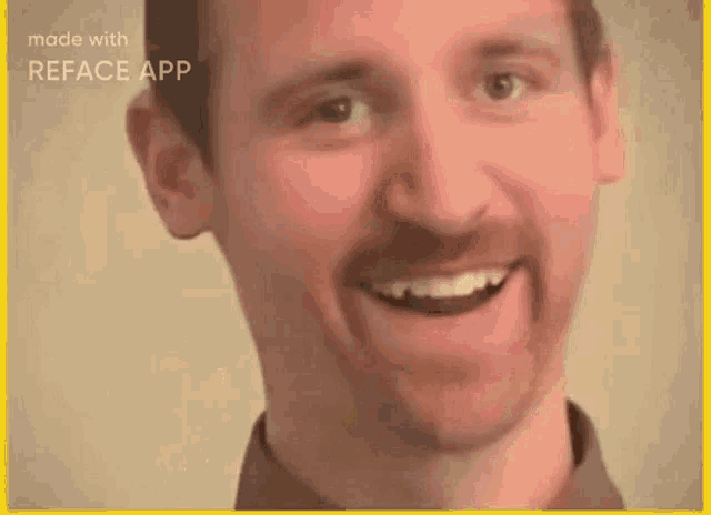 a man with a mustache is smiling with his mouth open and his teeth showing .