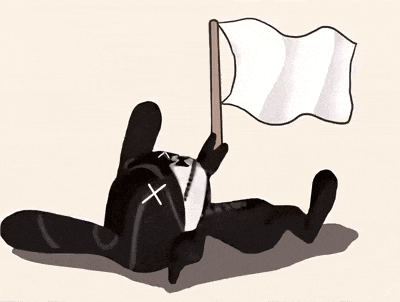 a cartoon rabbit is laying down and holding a flag