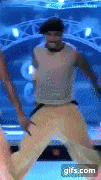 a gif of a man dancing with a jbl logo in the background