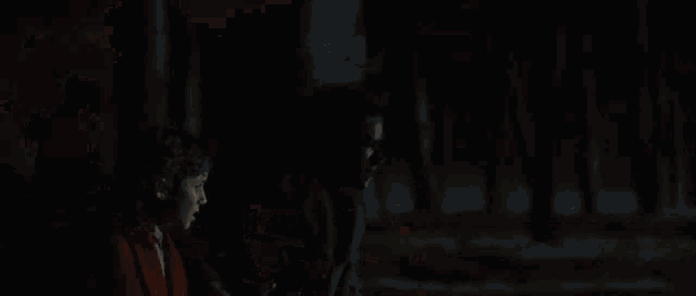 a dark background with a lot of smoke coming out of the bottom