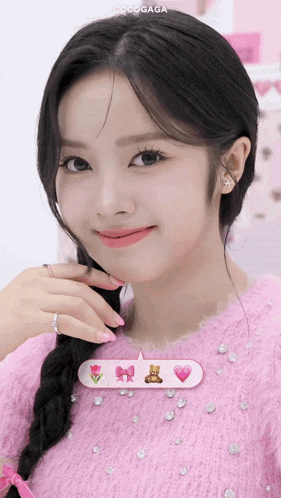 a girl in a pink sweater has a speech bubble that says cocogaga on it