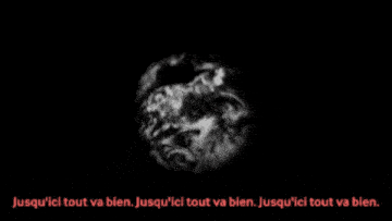 a black and white photo of an explosion on a black background