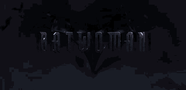 the word batwoman is on a dark background with bats