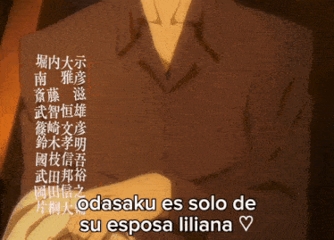 a man in a suit is holding a piece of paper with the words odasaku es solo de su esposa liliana written below him