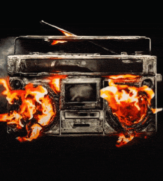 a boombox that is on fire with flames coming out of it