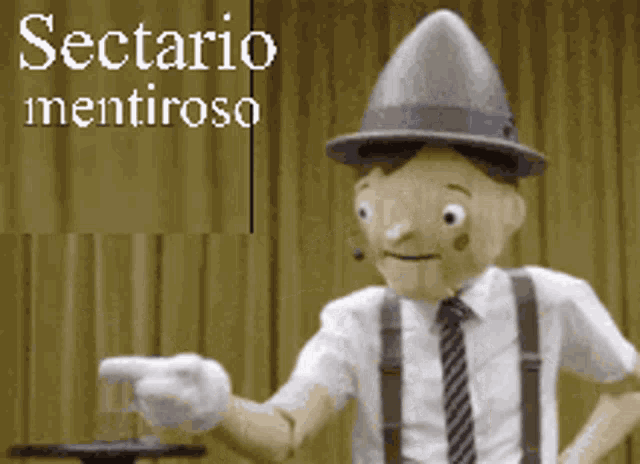 a puppet is pointing at something with the words sectario mentiroso in the background