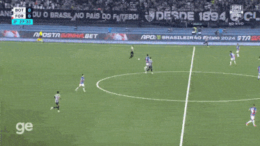 a soccer game is being played on a field with advertisements for betano betano betano and others