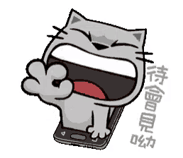 a cartoon cat is holding a cell phone in its paws and making a funny face .