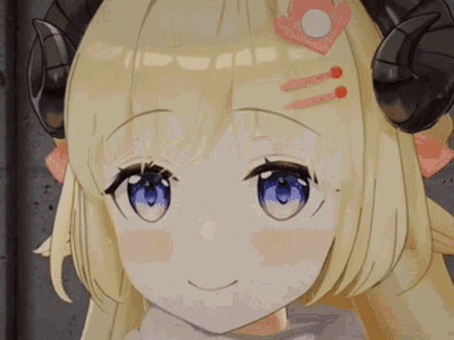 a close up of a girl with horns on her head and blue eyes .