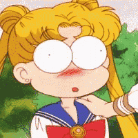 a close up of a cartoon character with big eyes and a red bow