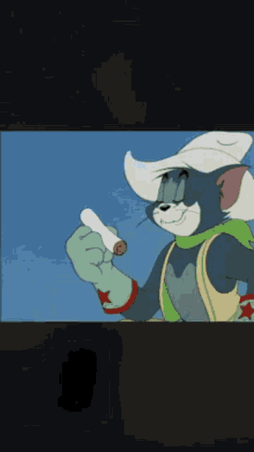 a cartoon of tom wearing a cowboy hat and gloves