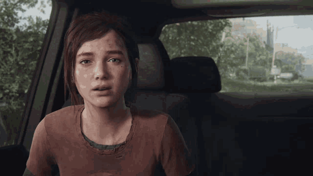 a woman is sitting in the back seat of a car and looking out the window