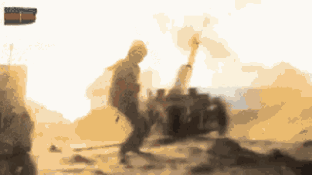 a blurred image of a soldier firing a cannon with the flag of azerbaijan in the background
