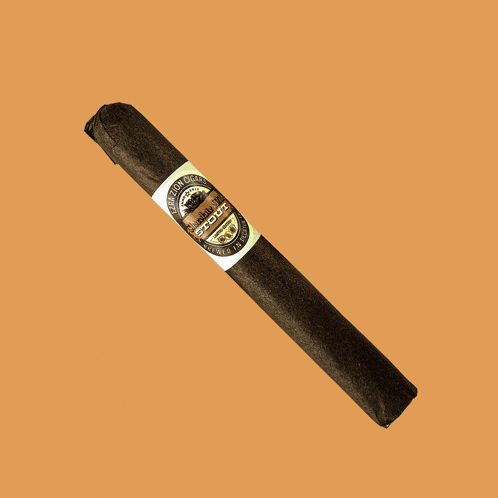 a cigar is wrapped in brown paper with a white label