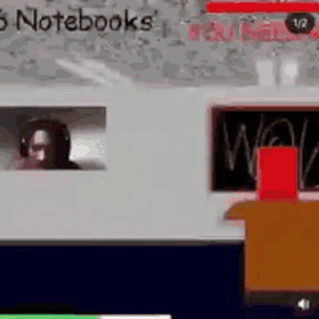 a man wearing headphones is looking out a window at a laptop computer .