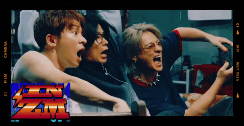 a group of men are playing a video game and the word film is on the bottom